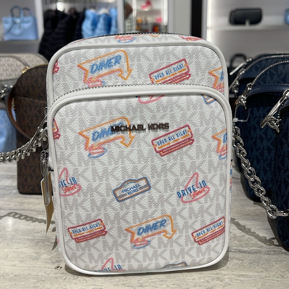 MICHAEL KORS
Jet Set Md Printed Signature Logo Crossbody NS CHAIN XBODY Flight - Picture 13 of 16